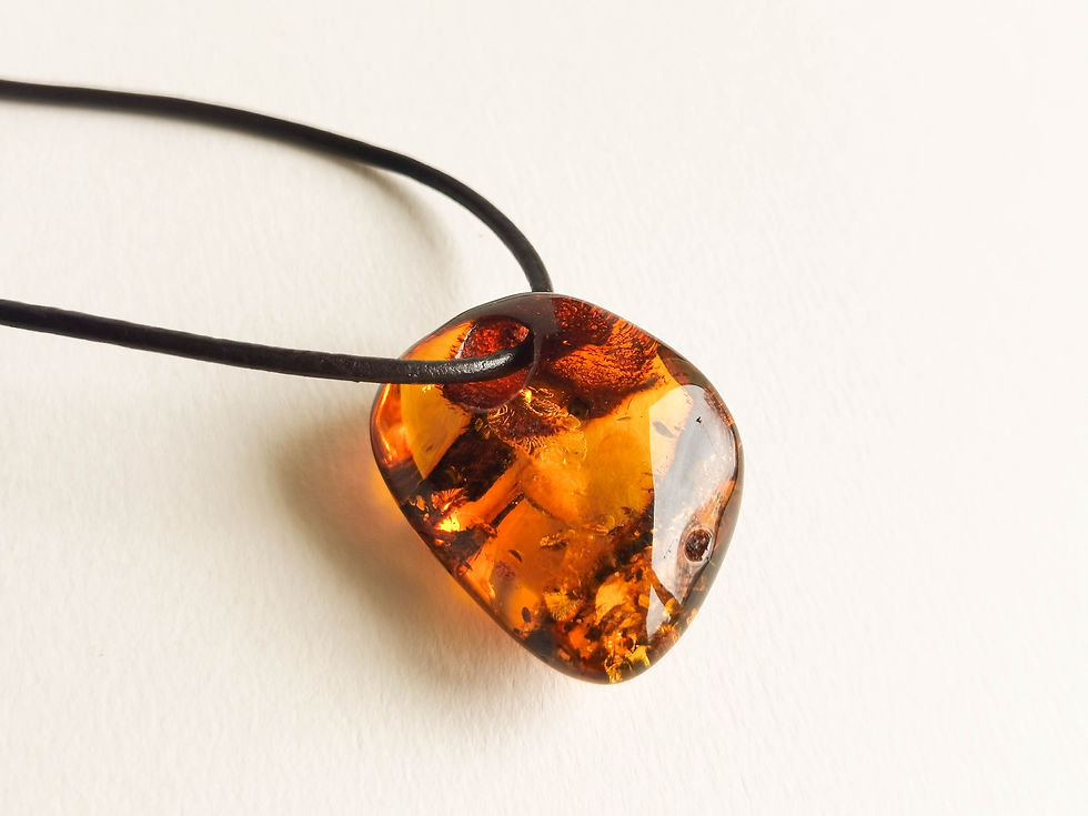 Thumbnail: Shiny cognac color amber pendant with natural hole on genuine leather strand