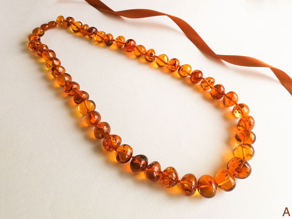 Thumbnail: Bright and intense cognac color natural amber nuggets necklace