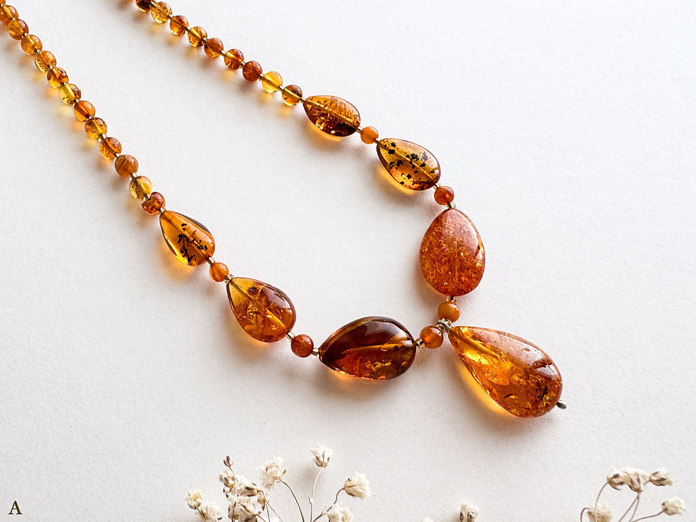 Light cognac and green colors natural amber drops necklace