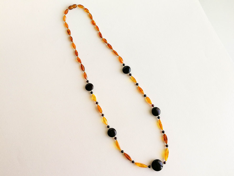 Thumbnail: Cognac color almonds and cherry coin shape beads amber necklace