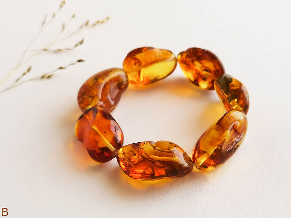 Very large natural shapes genuine amber bracelet in cognac color