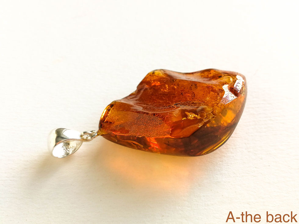 Thumbnail: Natural amber rhombus shape cognac color small pendant