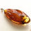 Thumbnail: Very large dark cognac color natural amber rhombus pendant