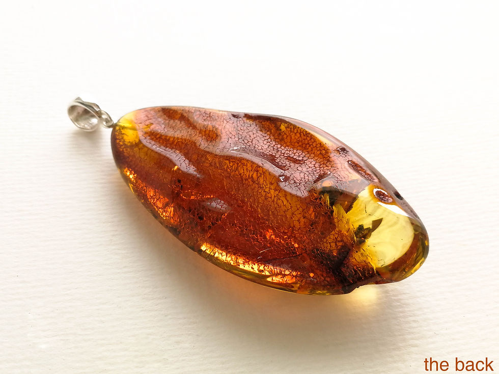 Thumbnail: Very large dark cognac color natural amber rhombus pendant