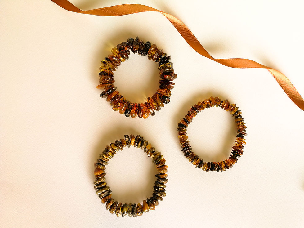 A set of 3 dark green and brown color chips amber bracelets