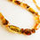 Thumbnail: Cognac and green colors amber natural beads necklace