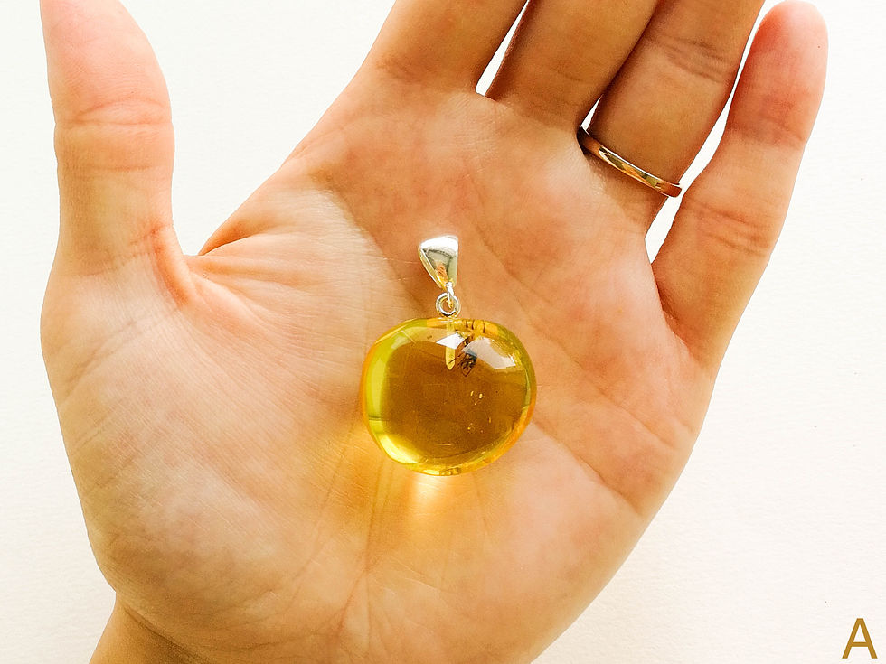 Thumbnail: Almost round shape genuine amber pendant with insect in lemon/cognac color