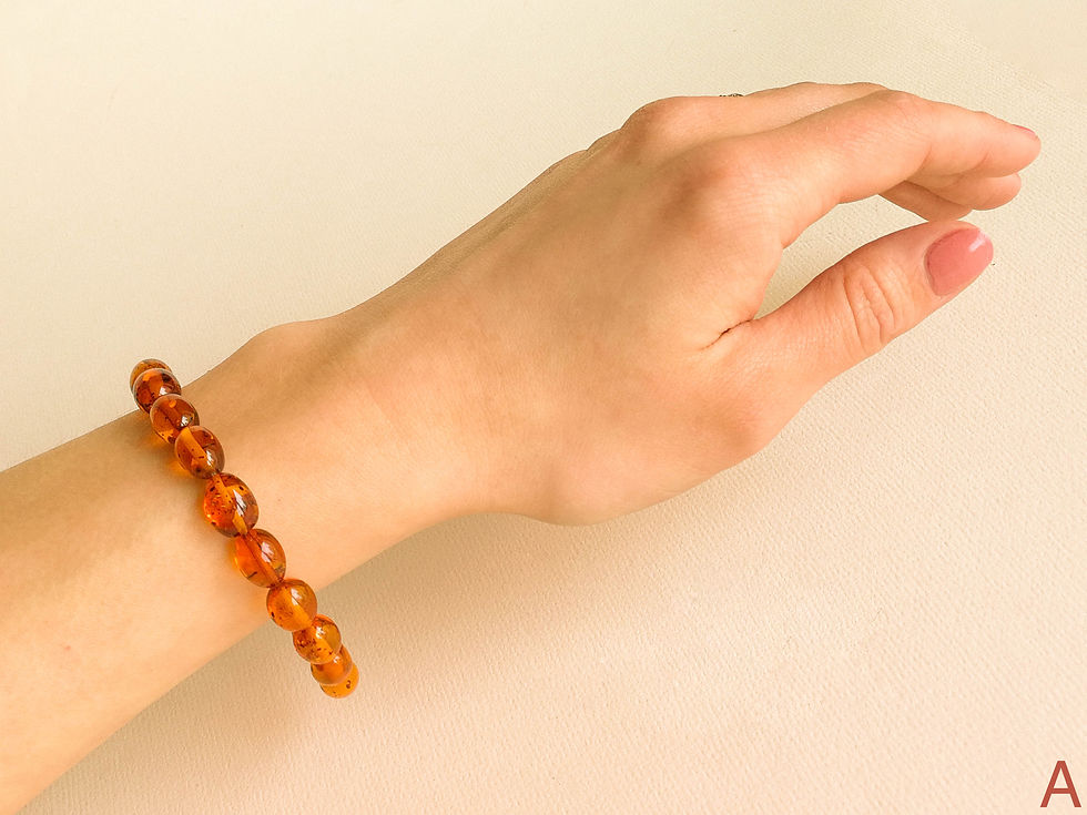 Thumbnail: Small oval beads cognac color amber bracelet