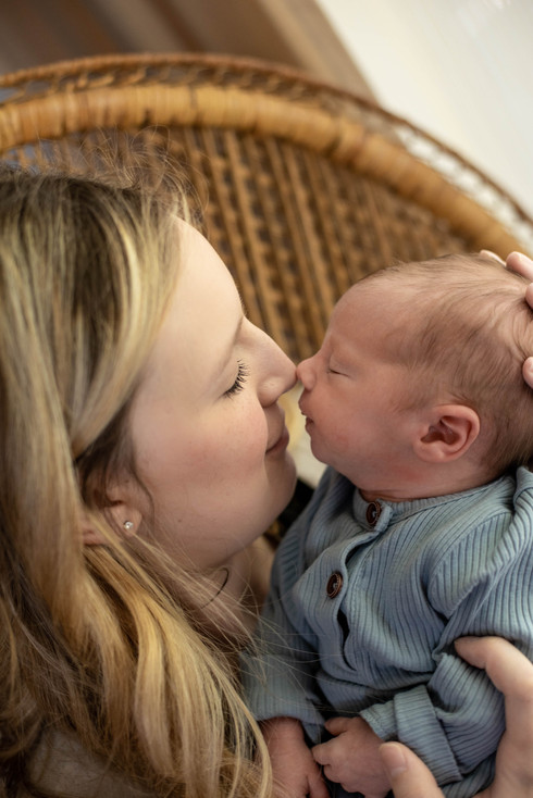 Newborn Photography, photographer, studio, natural light, taco pose, womb pose, cream, blue, baby boy, 2 weeks old. head on hands, mom and me, peacock chair 
