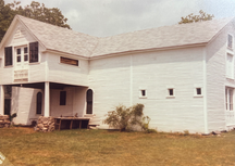 Very early image of Scoop Deck builidng before it was an ice cream shop. Still looking like a horse barn. 