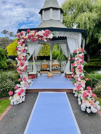 Elevate your wedding or event with stunning floral gazebo décor by Bandhan Events Our beautifully designed gazebos are adorned with lush, intricate floral arrangements, creating a romantic and enchanting ambiance. Perfect for outdoor ceremonies or as a striking centerpiece, these gazebos can also be seamlessly transformed into mandaps for traditional weddings. With bespoke options available, we tailor every detail to match your vision, incorporating your chosen colors, themes, and style. Whether you desire classic elegance or a modern twist, our floral gazebo décor promises to leave a lasting impression, making your special day truly unforgettable.