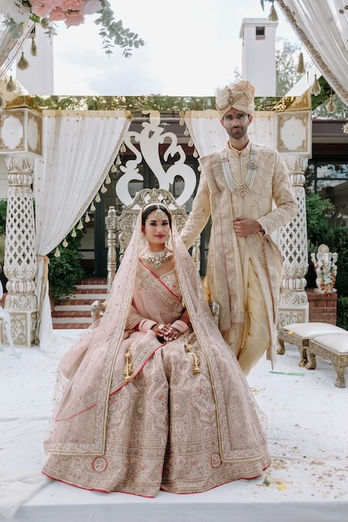 Discover the elegance of our Haveli Mandap by Bandhan Events, a stunning 4-pillar structure perfect for traditional weddings. Fully customizable with luxurious florals, it creates a breathtaking centerpiece tailored to your vision. Designed to reflect timeless charm and cultural significance, the Haveli Mandap can be adorned with your choice of flowers, colors, and fabrics to suit your theme. Ideal for Melbourne weddings, this mandap blends tradition with bespoke artistry, ensuring a memorable setting for your special day. Let us help bring your dream wedding to life with our beautifully crafted, customizable Haveli Mandap.