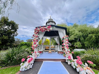 Elevate your wedding or event with stunning floral gazebo décor by Bandhan Events Our beautifully designed gazebos are adorned with lush, intricate floral arrangements, creating a romantic and enchanting ambiance. Perfect for outdoor ceremonies or as a striking centerpiece, these gazebos can also be seamlessly transformed into mandaps for traditional weddings. With bespoke options available, we tailor every detail to match your vision, incorporating your chosen colors, themes, and style. Whether you desire classic elegance or a modern twist, our floral gazebo décor promises to leave a lasting impression, making your special day truly unforgettable.