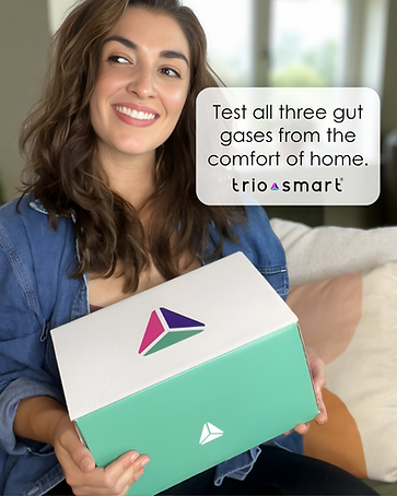 Young woman holding Trio-Smart kit
