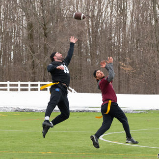 Wagner Lawn Care receiver Adam Vastopa looks in a catch over his shoulder while the pass is being de