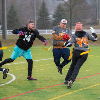 Players battle through torrential rain Sunday night at the West Orillia Sports Complex.