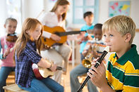 Students playing instruments
