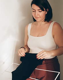 Ava folding baby clothes