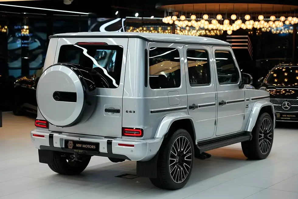 Miniature : SUV Mercedes G-Wagon argenté avec SRK MOTORS, G 63, V8 Biturbo vue arrière.
