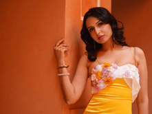 A WOMAN IN YELLOW DRESS