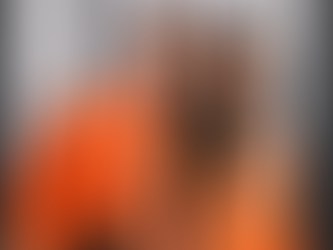 COUPLE IN ORANGE DRESS TWINNING