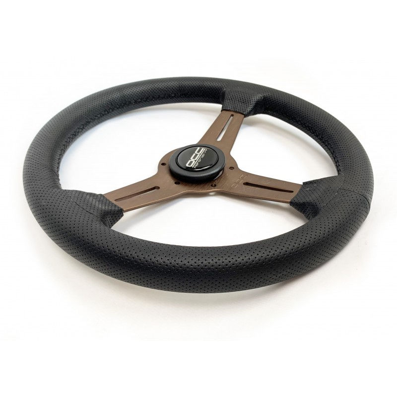 Miniatura: Volante plano clásico piel perforada brazos bronce OCC