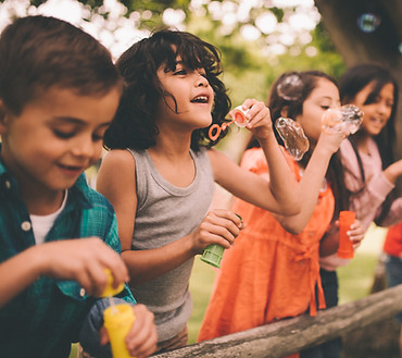 Kids Blowing Bubbles