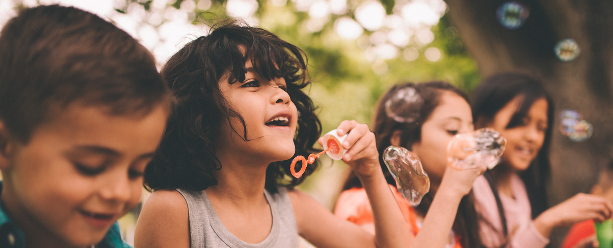 Children Blowing Bubbles