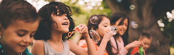 Kids Blowing Bubbles