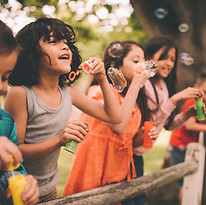 Kids Blowing Bubbles