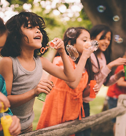 Kids Blowing Bubbles