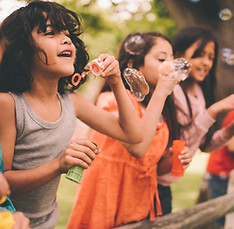 Kids Blowing Bubbles
