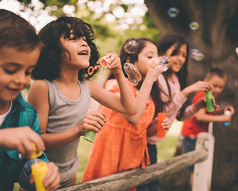 Kids Blowing Bubbles
