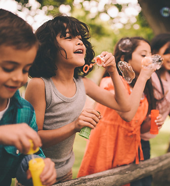 Kids Blowing Bubbles
