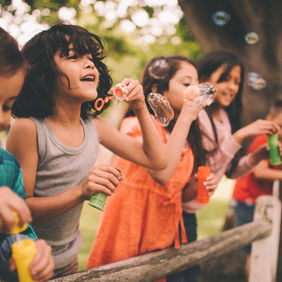 Kids Blowing Bubbles