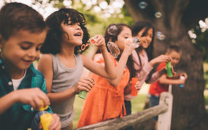 Kids Blowing Bubbles