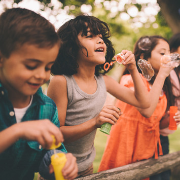 Kids Blowing Bubbles