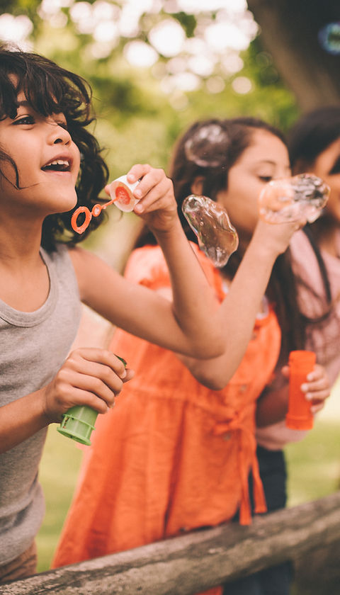 Kids Blowing Bubbles