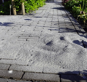 zand invegen voor de voegen