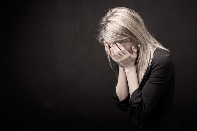 Sad woman, Hurt Law Erie Pa
