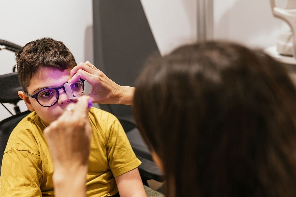 An optometrist corrects a child’s eye alignment through vision therapy.
