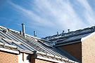 Commercial sloped roof intergrated with exterior components