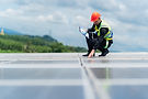 Superior Roofing technician performing flat roof analysis Calgary
