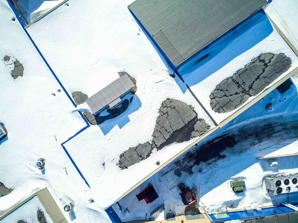 snow-covered flat roof in Calgary