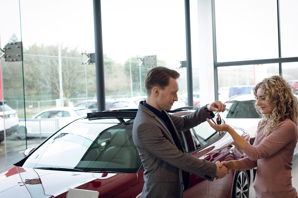 car-salesman-handing-car-keys-to-curly-woman-2026-03-25-01-20-41-utc