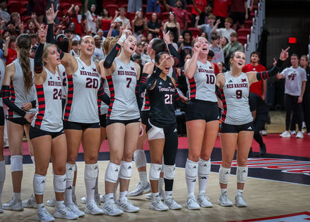 BLAIR ERA BEGINS WITH A WIN AS RECORD CROWD FUELS LADY RAIDERS