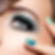 woman-s-eye-with-turquoise-makeup-long-false-eyelashes-macro-shot.jpg