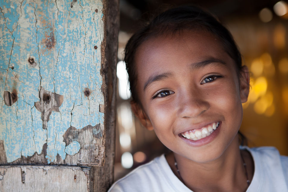 Portrait%2520of%2520a%2520smiling%2520Filipina%2520girl%2520from%2520impoverished%2520neighborhood%2