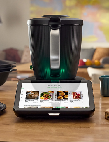 Thermomix TM7 displaying Cookidoo guided cooking recipes on screen