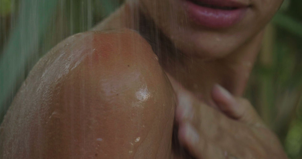 lady in shower with water